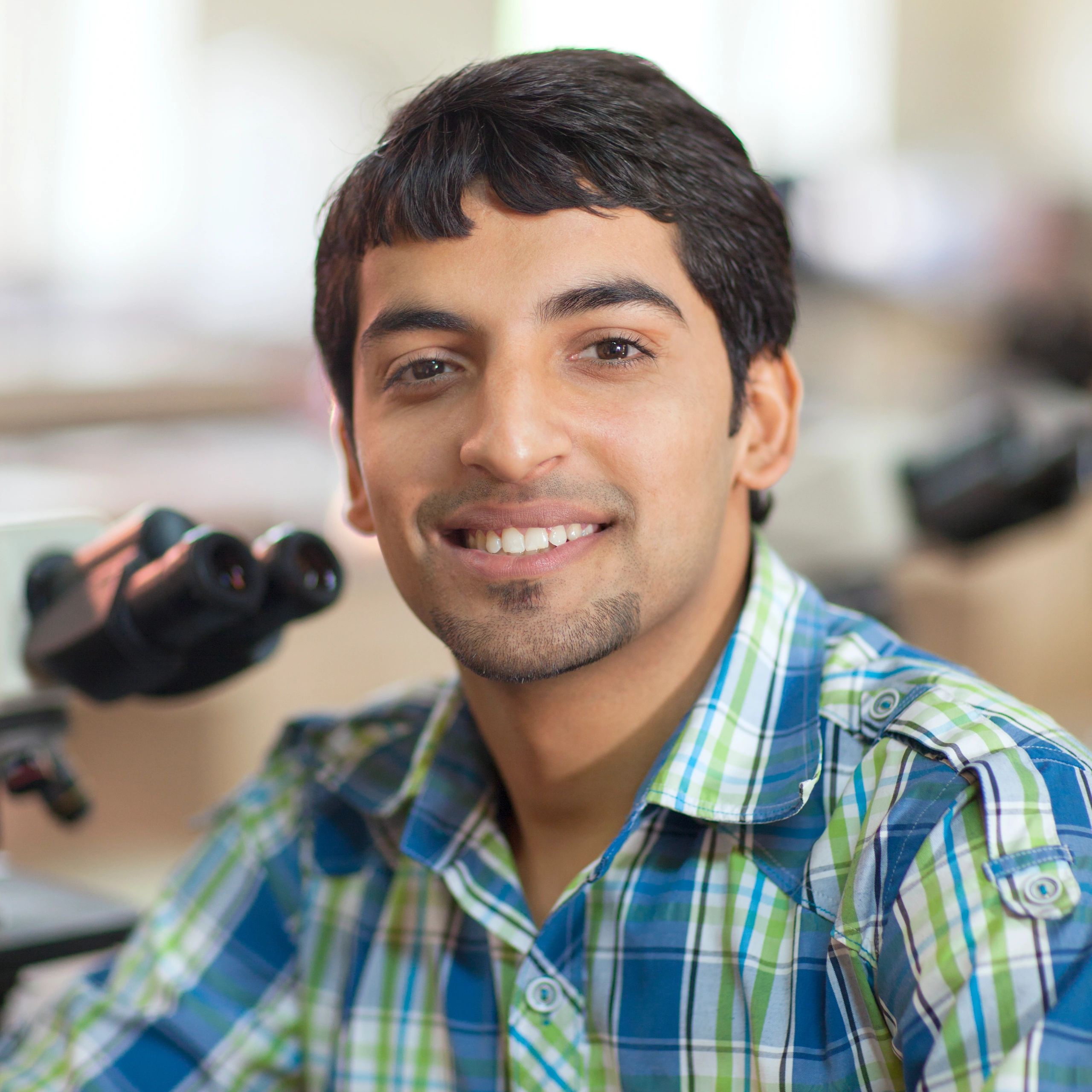 Indian student studying science in a laboratory