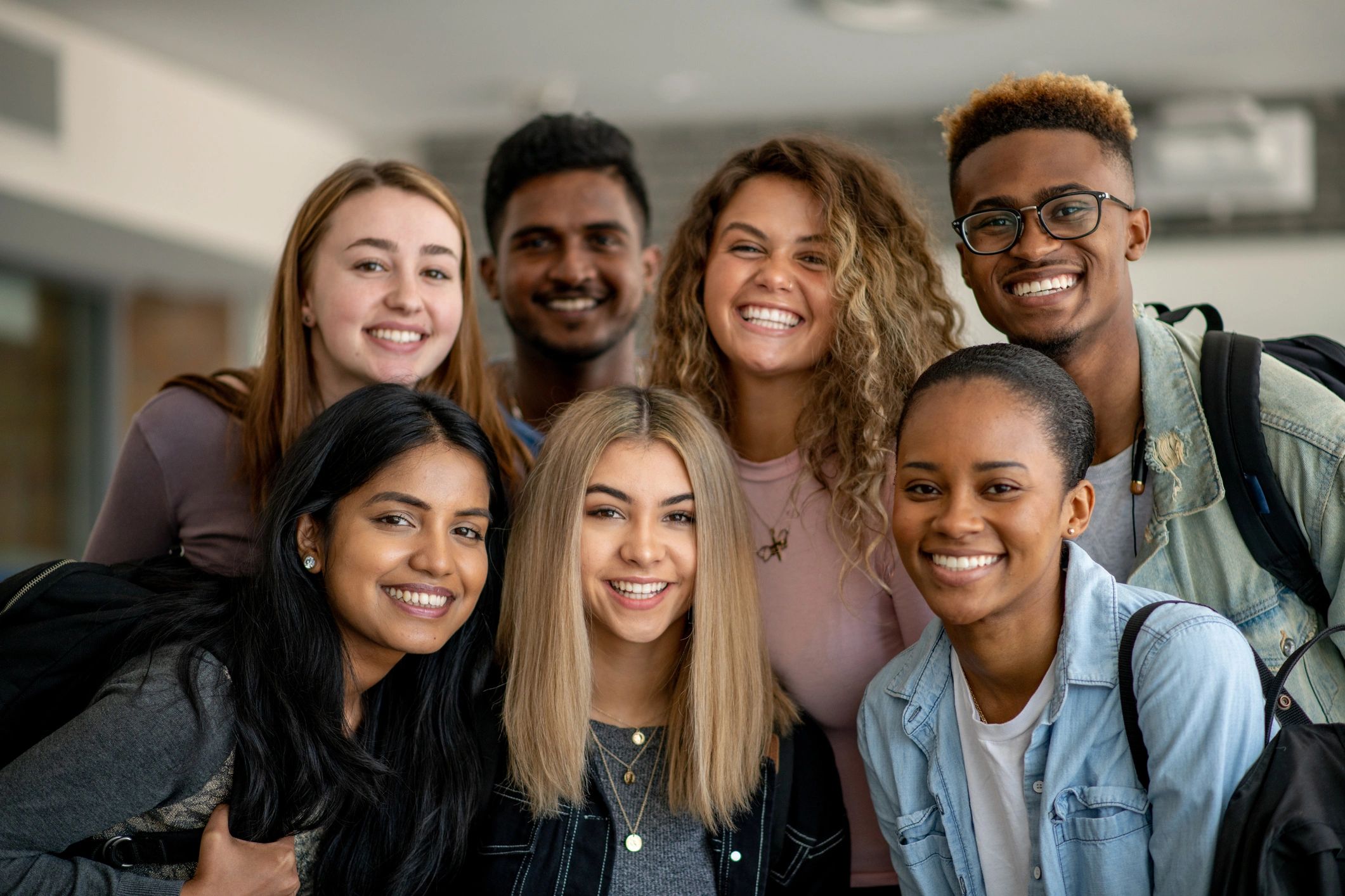 Group of college students smiling together